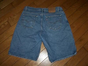 VINTAGE USA LEVI'S 560 COMFORT FIT DENIM JEANS 36" W MEDIUM WASHED INDIGO BLUE - Picture 1 of 2