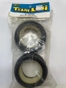 Vintage team Losi front buggy tires A-7202s ribbed silver wide xx xxx - Picture 1 of 3