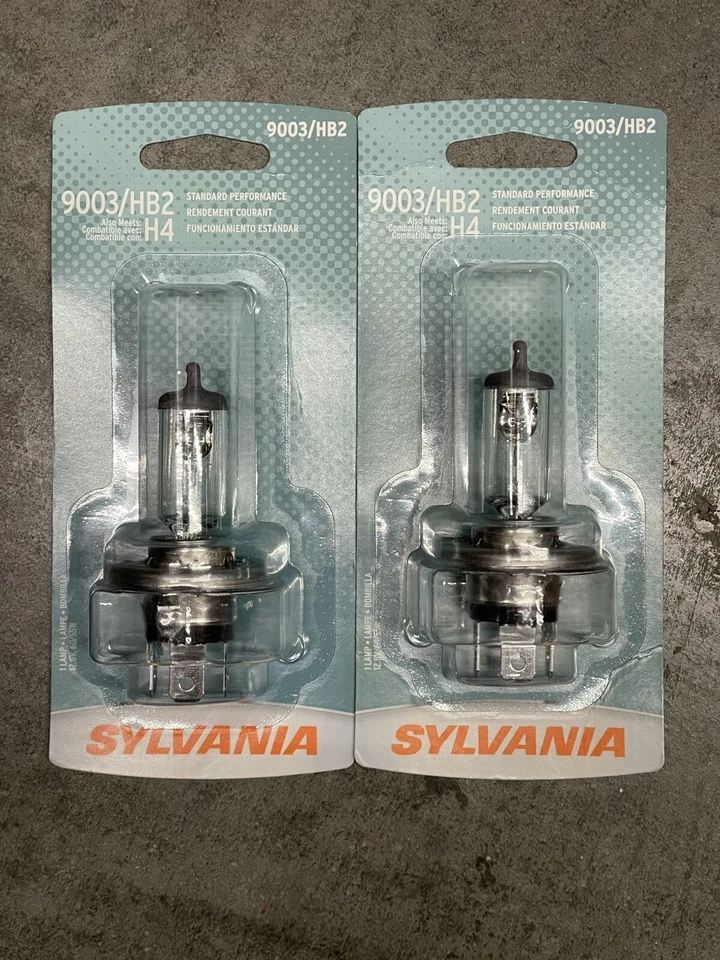 NEW Sylvania 9003 HB2 H4 Pair Set Halogen Headlight Bulbs 2 SEALED 3100K - Изображение 1 из 1