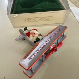 Hallmark Keepsake- Spirit of Christmas Santa in Plane Ornament - Picture 1 of 3
