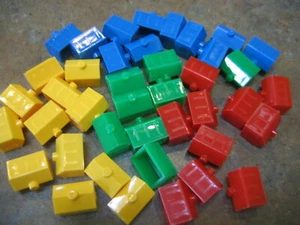 MONOPOLY JUNIOR JR Ersatzteile Stücke HÄUSER ROT GELB BLAU GRÜN - Bild 1 von 1