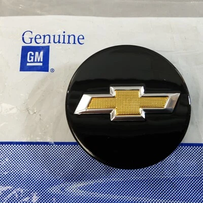 Nueva tapa central de rueda genuina GM negra/dorada para Chevrolet Trax 24-25 Foto 1 de 4
