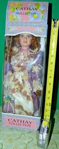 Cathay Collection Porcelain doll with Auburn hair and hat. Loose in box Freeship - Picture 1 of 8