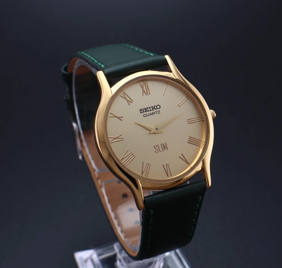 RARO Reloj Pulsera Seiko Delgado Redondo Cuarzo Caballeros - (ENVÍO GRATUITO) Foto 1 de 4