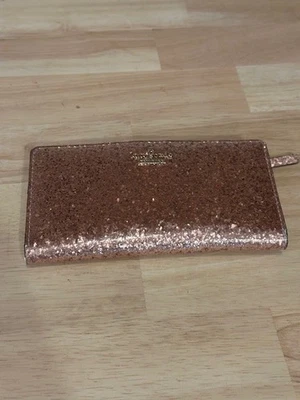 Cartera chequera Kate Spade Glitter Bug con encaje oro rosa Foto 1 de 4
