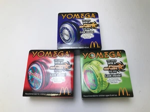 Giocattoli Happy Meal McDonald's Yomega Yo-Yo X-Brain Firestorm 2000 1,5,6 vintage nuovi con scatola - Foto 1 di 1