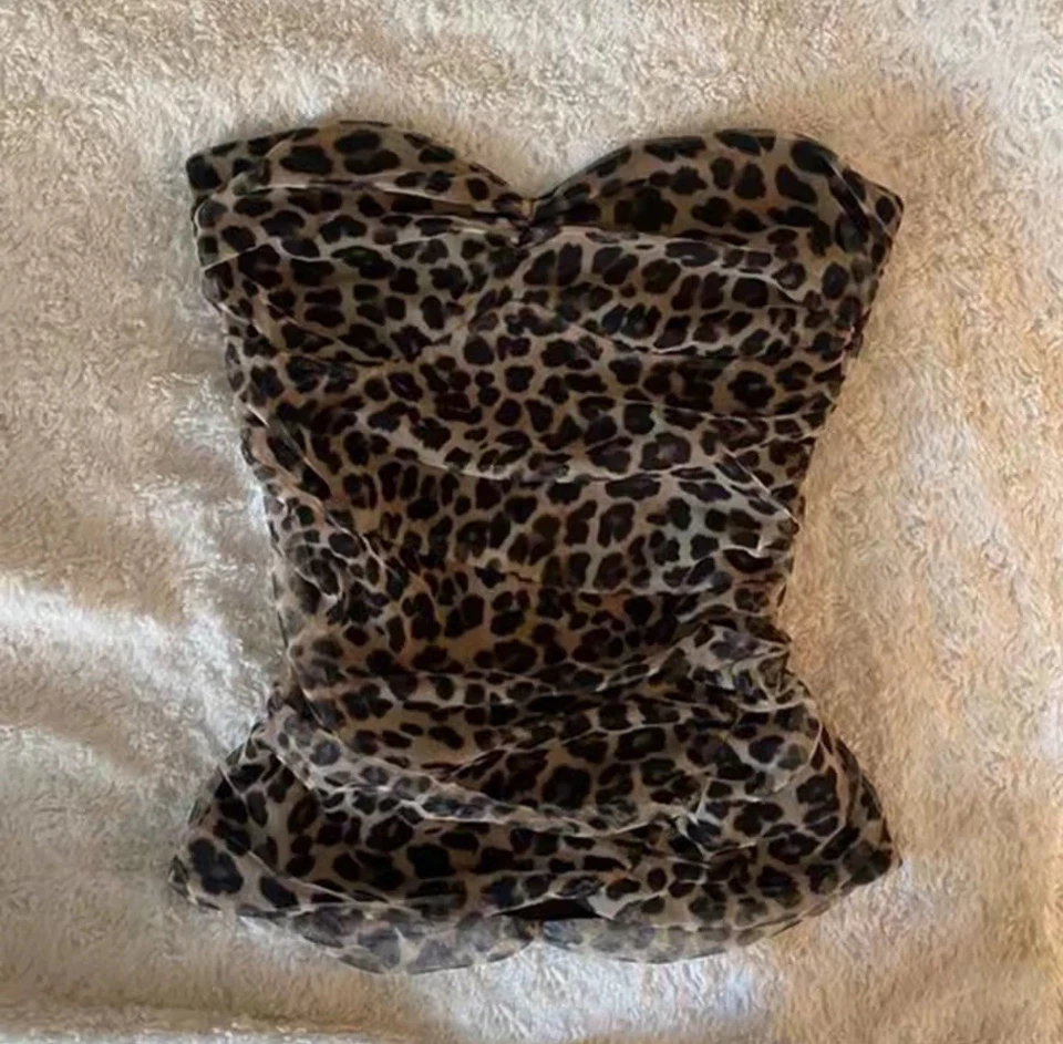 Lindo top sin mangas de moda con estampado de leopardo Y2K de la década de 2000 para mujer Foto 1 de 1