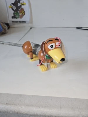 Disney Pixar Toy Story Rolling Slinky Dog Metal Slinky Pull-Along Juguete DD1 Foto 1 de 4