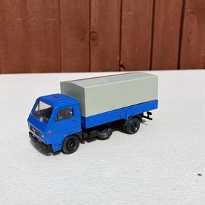Conrad 3036 MAN 8.90F COVERED TRUCK (380) NO BOX 1:50 - Picture 1 of 9