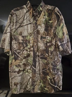 Camisa Winchester Para Hombres Abotonada Grande Ventilada Caza Realtree Maderas Duras Camuflada Foto 1 de 4