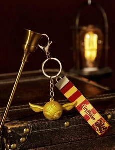 New HARRY POTTER Keychain QUIDDITCH Purse Charm GRYFFINDOR Ring GOLDEN SNITCH - Picture 1 of 6
