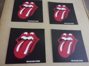 JUEGO DE 4 POSAVASOS DE BEBIDA CON LOGOTIPO DE LENGÜETA DE PIEDRAS NUEVO      - Imagen 1 de 2