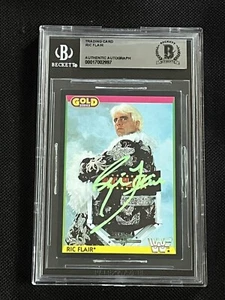 RIC FLAIR 1992 MERLIN GOLD WWF SIGNED AUTOGRAPHED CARD BECKETT BAS AUTHENTIC - Picture 1 of 2
