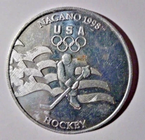Ficha de los Juegos Olímpicos de Invierno 1998 Nagano Japón EE. UU. HOCKEY medallón moneda General Mills - Imagen 1 de 2