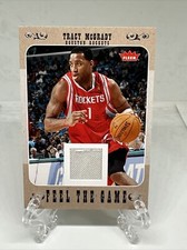 2007-08 FLEER BASKETBALL TRACY MCGRADY FEEL THE GAME JERSEY RELIC ROCKETS