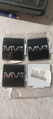 EM GENERAL MV-1 EMBLEMA, PARRILLA DELANTERA, MV-1 PT018360 Foto 1 de 2