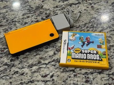 Yellow Japanese Nintendo DSi (XL)LL w/ Super Mario Bros FREE US SHIPPING - Image 1 of 4