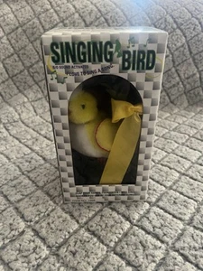 Juguete pájaro cantor amarillo - Aplaude con las manos con pilas con cadena + percha - Imagen 1 de 6