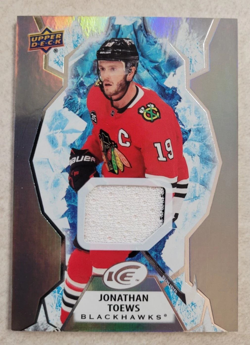 2021-22 Upper Deck Ice #64 Jonathan Toews Jersey Parallel Blackhawks