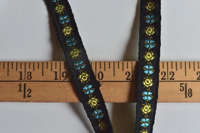 JACQUARD  FLORAL DESIGN BRAID TRIM BLUE ON BLACK   5 YARDS X  1/2  INCHES WIDE - Image 1 of 2