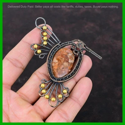 Venta de Navidad Cobre Chakra Sacro Piedra Solar Alambre Envuelto Pájaro Nuevo Colgante Foto 1 de 4