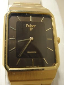 PULSAR QUARTZ WATCH, TWO TONE DIAL CONDITION IS VERY GOOD, ADJUSTABLE BAND - Picture 1 of 4