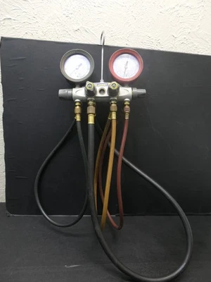 Colector de 4 válvulas con mangueras Yellow Jacket Brute II Foto 1 de 4