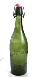 04a Botella ALEMANA WAITZINGERBRAU de cerámica de vidrio verde a presión - Imagen 1 de 4