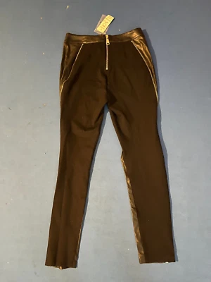 Pantalones ajustados o acampanados Bebe negros de cuero sintético con cremallera lateral talla 4 nuevos con etiquetas Foto 1 de 4