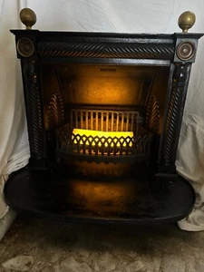 1800's classic wrought iron fireplace with brass fenestration. - Picture 1 of 1