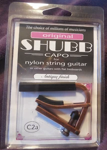 Capotasto Shubb C2a finitura anticato cromato per chitarre a corda nylon nuovo con scatola - Foto 1 di 1