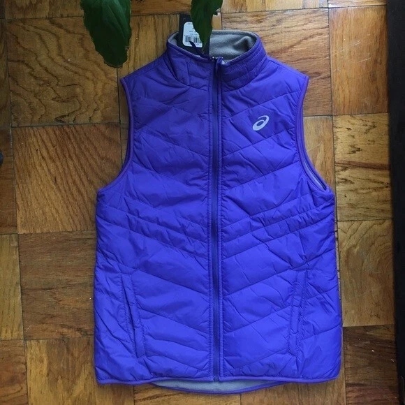 Chaleco acolchado para correr Asics, para mujer mediano, azul, excelente estado Foto 1 de 2