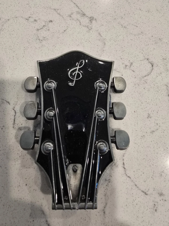 Hebilla de cinturón para cabezal de guitarra Foto 1 de 1