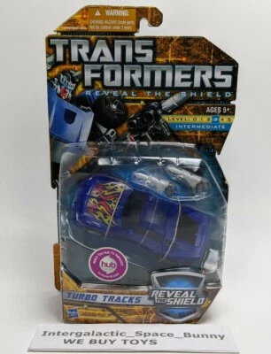 Hasbro Transformers Generations Reveal The Shield Deluxe Turbo Tracks MOC - Image 1 of 2