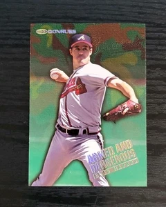 1997 Donruss Armed and Dangerous #13 Greg Maddux /5000 - Picture 1 of 2