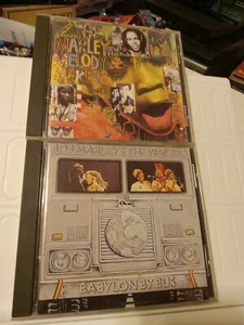 2x REGGAE CDS Babylon By Bus Bob Marley & ONE BRIGHT DAY ZIGGY MELODY MAKERS - Picture 1 of 9