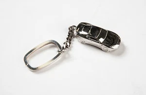  ASTON MARTIN DB7 SCHLÜSSELRING, GESCHENK, ANTHONY HOLT 925 STERLING SILBER BOND 007 - Bild 1 von 1