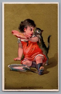 Antique Victorian Trade Card "Two Interested" Child & Cat Fighting Over Food - Picture 1 of 2