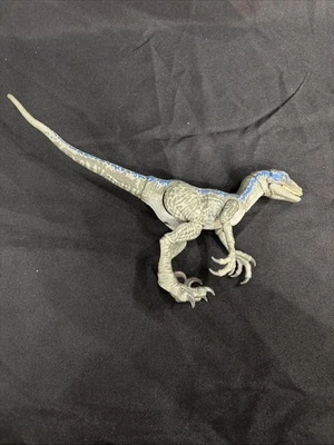 Figura de acción azul Velociraptor Jurassic World juguete de dinosaurio Mattel BAC de segunda mano Foto 1 de 2
