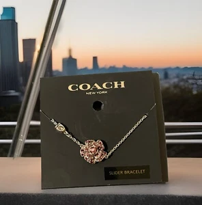 COACH NEW YORK FLOWER SLIDER BRACELET - Picture 1 of 3