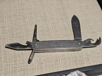 Cuchillo suizo plegable vintage 1981 Army Camillus con 2 hojas y 2 abrelatas Foto 1 de 4