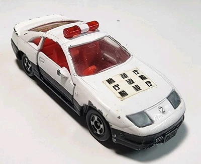 Coche de policía vintage Tomy Tomica #15 Nissan Fairlady Z 300ZX 1/59 diecast/plástico Foto 1 de 4