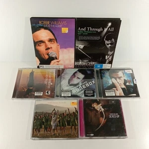 Lote de paquete de CD y DVD de Robbie Williams - Imagen 1 de 22