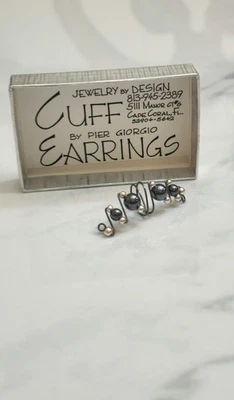 Pendiente brazalete vintage plateado y metálico azul-gris nuevo en caja Foto 1 de 4