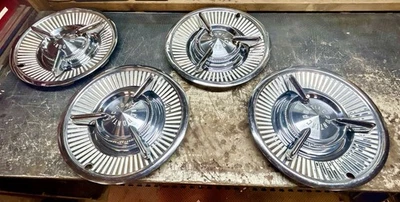 1957 PONTIAC 14” “SPINNER” HUBCAPS ( OEM USED SET Of 4 ) A+ A+ A+ - Image 1 of 4