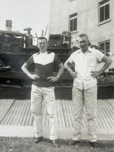 Vintage Photo 2 Men In Casual Clothes Standing By Army Equipment 3.5” BW - Picture 1 of 3