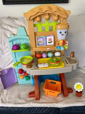 Fisher Price Laugh & Learn Grow The Fun Juego de Jardín a Cocina con 21 accesos. Foto 1 de 4