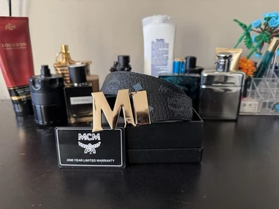 Cinturón de cuero coñac a negro con hebilla dorada reversible MCM Foto 1 de 2