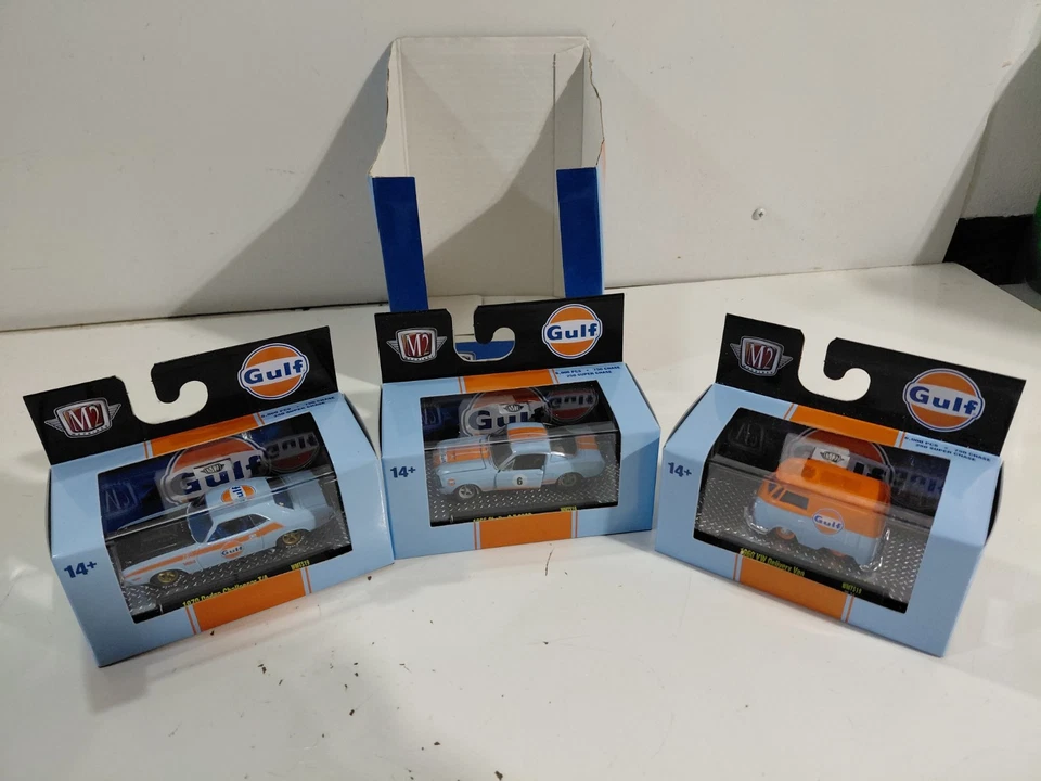 3 NIP M2 Machines 1:64 Die Cast Gulf Vehicle w/Display (VW Bus Shelby Challenger - Image 1 of 4