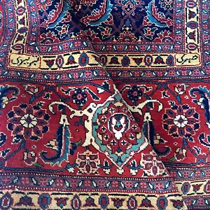 Tapis persan ancien tabriz mahi boutonné à la main rouge bleu vieux tapis